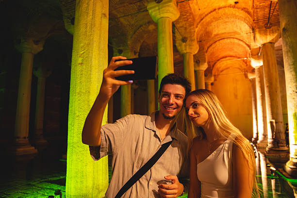 Young tourist in underground Basilica Cistern in Istanbul