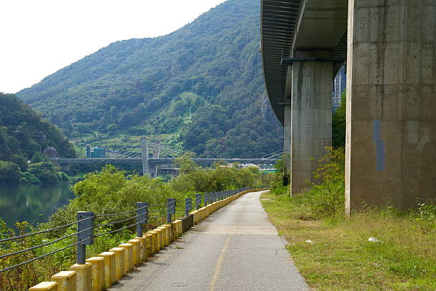 istock Bikeway with CableStayed Bridge View 2247642506