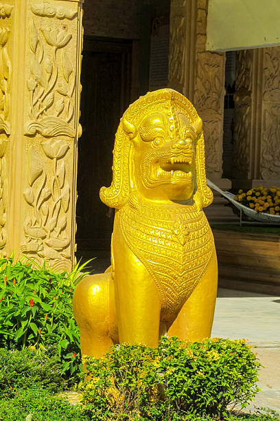 istock Qilin statue with intricate details standing in a temple courtyard, representing mythical creature in Chinese culture 2247643775