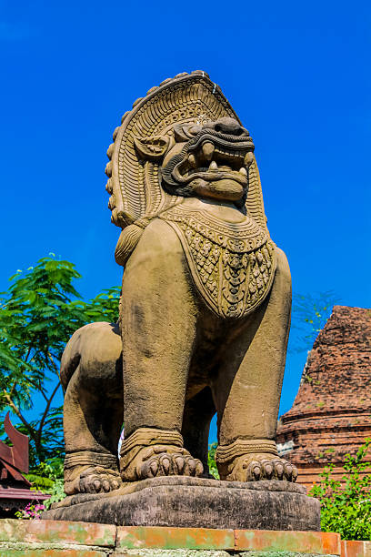 istock Qilin statue with intricate details standing in a temple courtyard, representing mythical creature in Chinese culture 2247643887