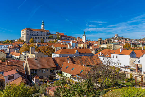 Mikulov town and castle in Czech Republic featuring historic architecture red rooftops hillside setting and clear daylight representing European heritage culture scenic landscape and landmark