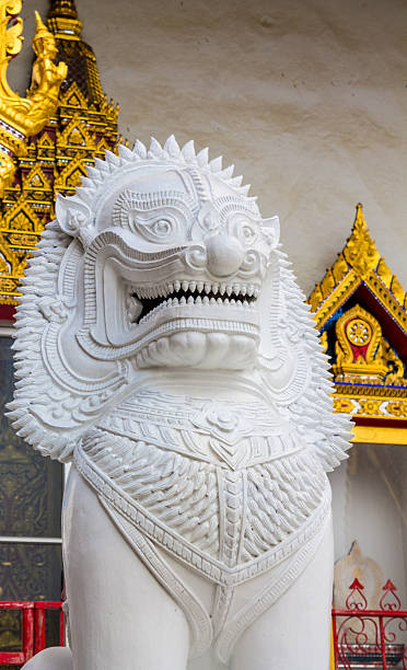 istock Qilin statue with intricate details standing in a temple courtyard, representing mythical creature in Chinese culture 2247644091