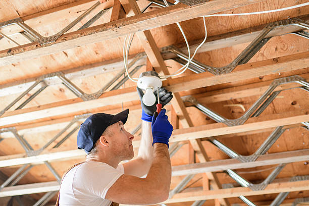 istock An Electrician Male Working on basement bulb 2247644421