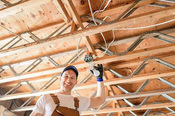 istock An Electrician Male Working on basement bulb 2247644422