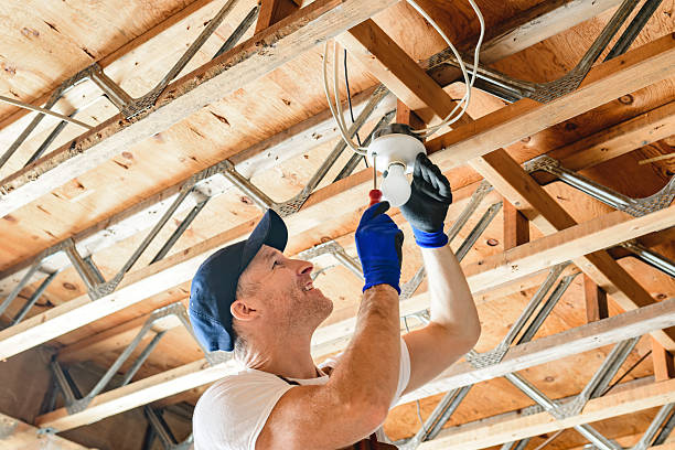 istock An Electrician Male Working on basement bulb 2247644438