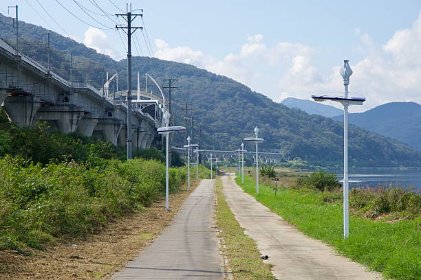 istock Solar Lamps Along River Bikeway 2247644480