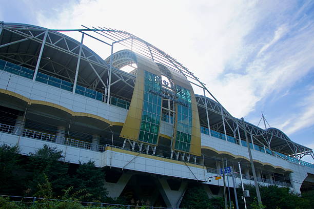 Baegyang-ri Station spans the slope above the Bukhangang, its curved roof and trusswork framing the river corridor on the upgraded Gyeongchun Line.