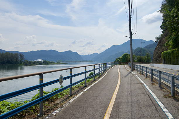 istock River Bikeway with Mountain Views 2247654654