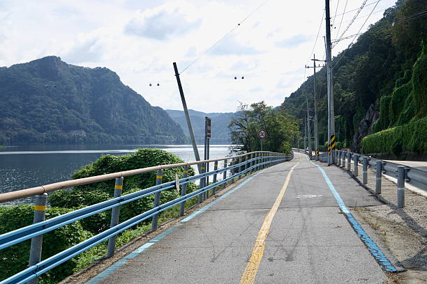 istock Riverside Bike Lane under Cable Car 2247656167