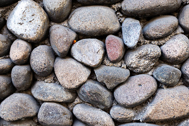 istock Natural Rough Stone Wall Texture Background with Various Shape and Color 2247656199