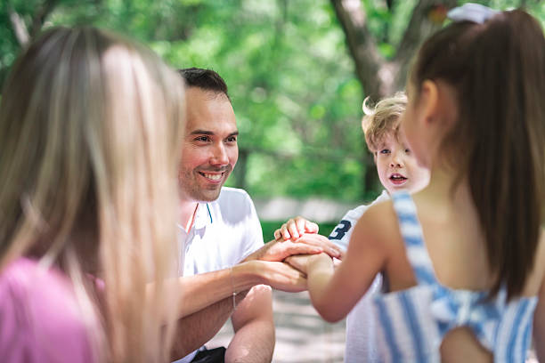 istock Father and mother with the son and daughters like a team 2247658709