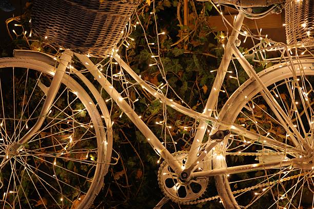 istock Enchanted White Bicycle Adorned with Twinkling Lights 2247658982
