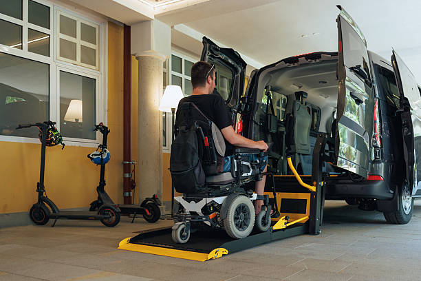 istock Person with disability uses accessible van ramp 2247660368
