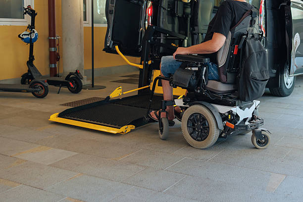 istock Disabled person readies for accessible transport 2247660387