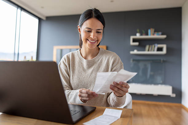 istock Happy woman working at home and smiling 2247662476