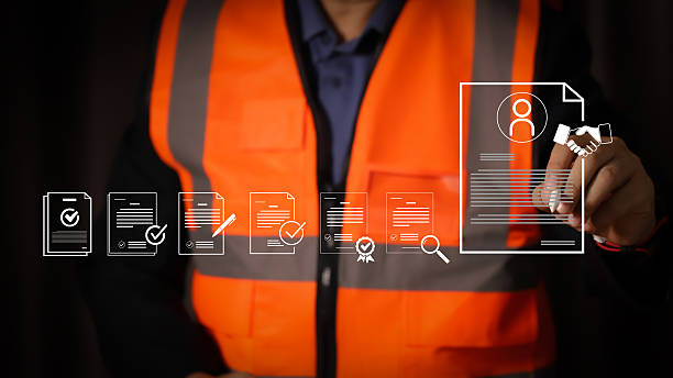 istock Construction worker signing digital contract agreement. Engineering business partnership and employment concept. Man hand using stylus pen on modern virtual document interface. 2247663606