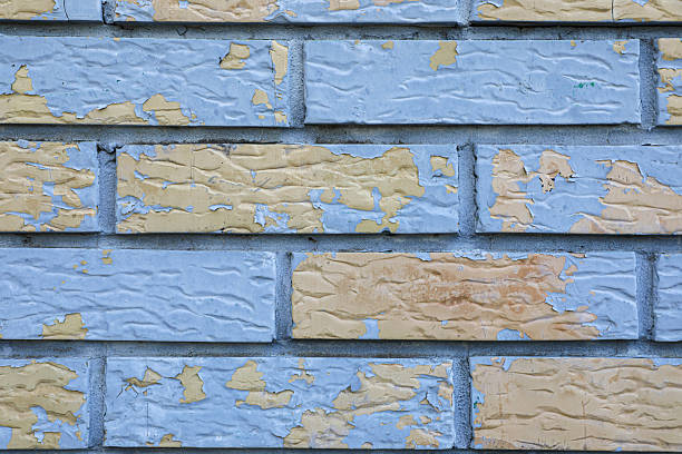 Various Wall Textures On Residential Houses In A Neighborhood, Showing Different Exterior Surfaces, Colors, And Materials. Close Up Details Of Plaster, Brick, Concrete, And Painted Walls Create Abstract Backgrounds, Architectural Surfaces, And Urban Design Elements For Use As Textures And Backdrops.