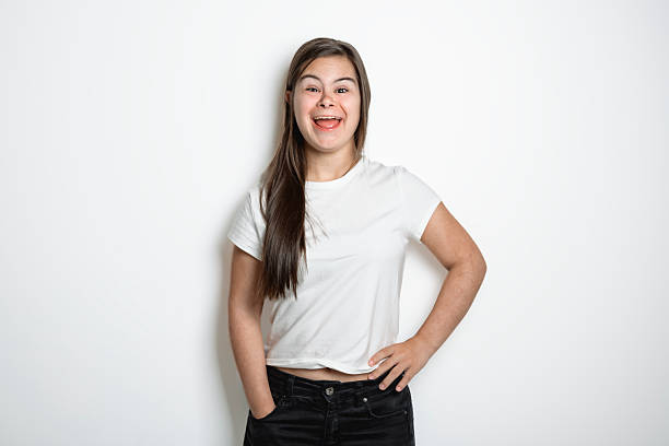 istock 18 years old child girl posing in white background 2247668966