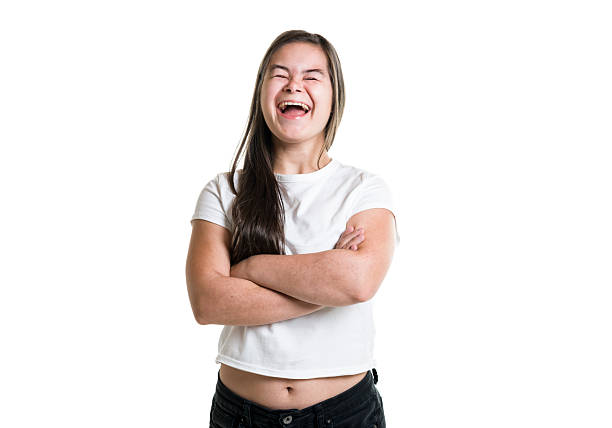 A 18 years old child girl posing in white background.
