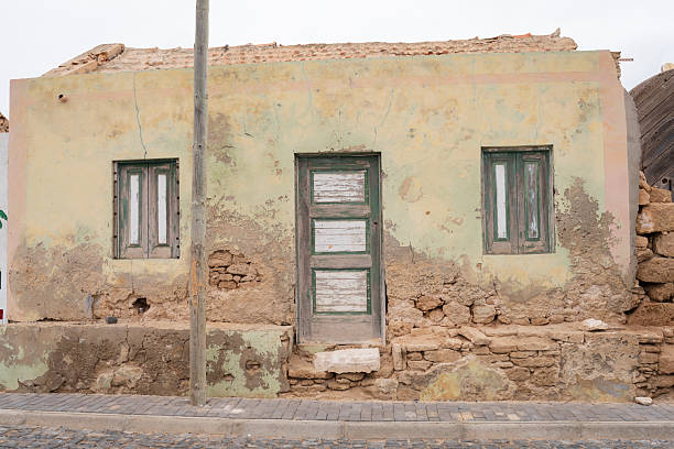 Cobbled street with humble and old house, vintage style with colorful house in Boa vista in Cape Verde