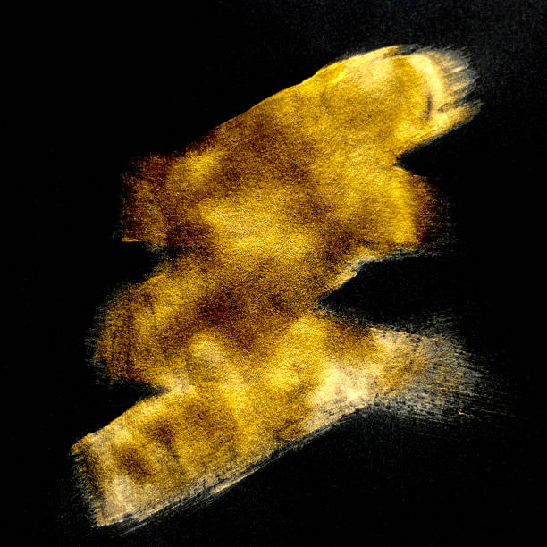 istock Abstract gold brush stroke on black canvas creates luminous warmth and texture 2247678281