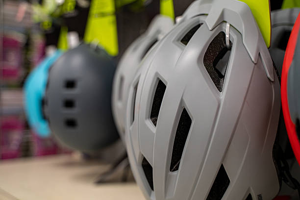 istock Close up of bicycle helmets on display. 2247679110