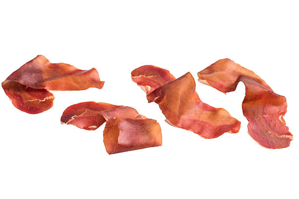 istock Cured cecina meat slices, spanish meat jerky isolated on white background. top view 2247679654