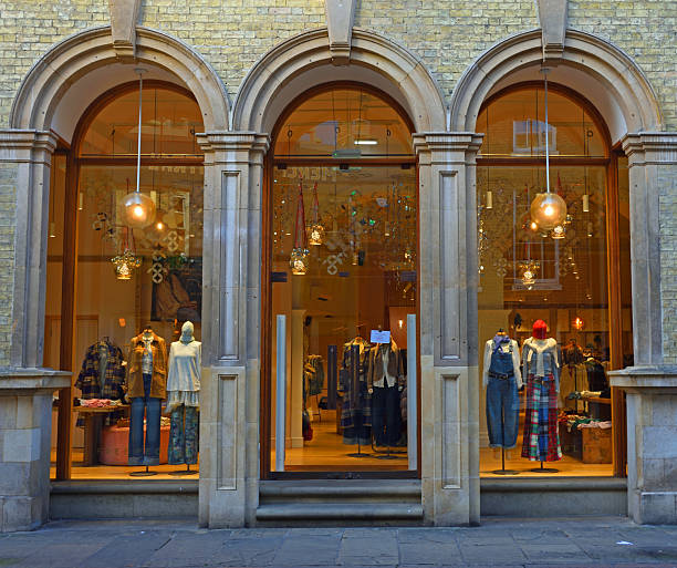 London, UK - October 02, 2021: People walking under James Bond 007 installation inside Burlington Arcade, the original luxury department store in London.