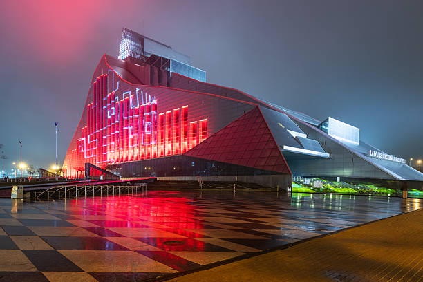 Riga, Latvia: November 17, 2025: Illuminated facade of the National Library of Latvia