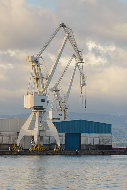 istock Port crane in a seaport, cargo transportation 2247682326
