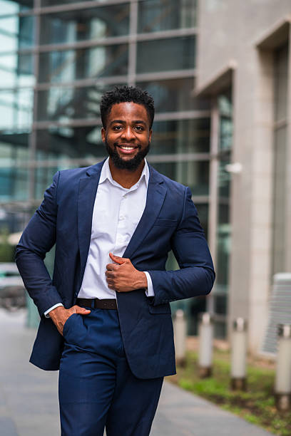 istock Young Black businessman walking outside with confidence 2247682638