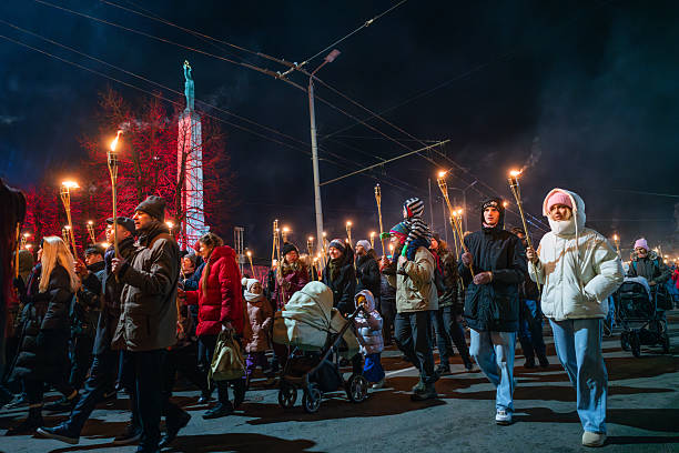 Riga, Latvia - November 18, 2025: The Torchlight procession is one of the traditions of 18 November - the Independence Day of Latvia.