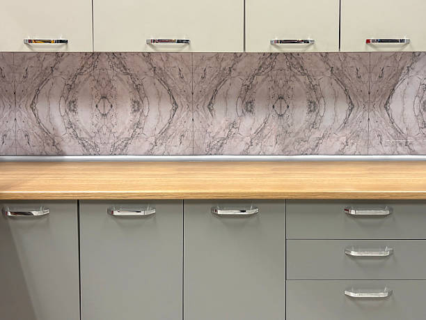 Modern kitchen interior design. Kitchen cabinet and kitchen counter with drawers. Front view kitchen background