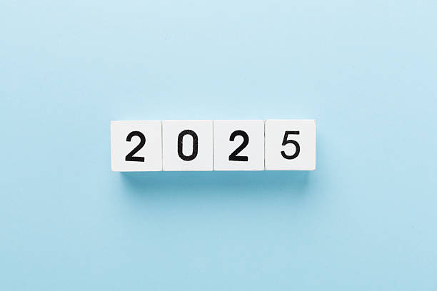 istock Cubes with 2025 on color background, top view 2247685196