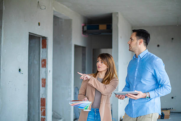 istock Real estate professionals inspecting home under renovation 2247686713