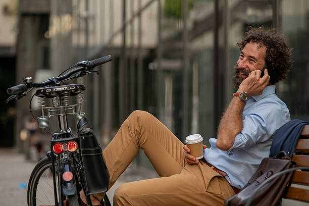 istock Bearded Man in Smart Casual Attire Relaxing with Tech - Urban Mindfulness 2247688179