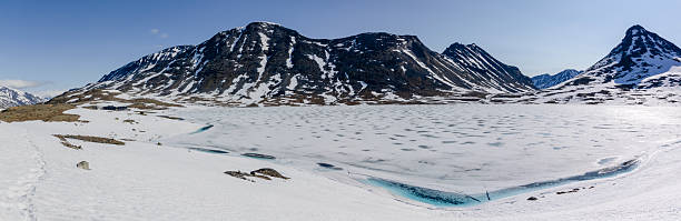 istock Snowy Leirdalen mountain landscape with clear blue sky 2247688842