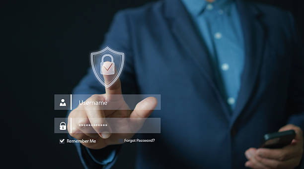 istock Cybersecurity login concept with businessman touching a virtual shield icon on a digital authentication screen, emphasizing secure access, password protection, identity verification, and data safety. 2247692144