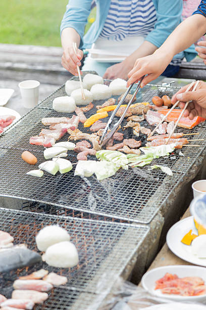 istock family enjoying barbecue 2247692415