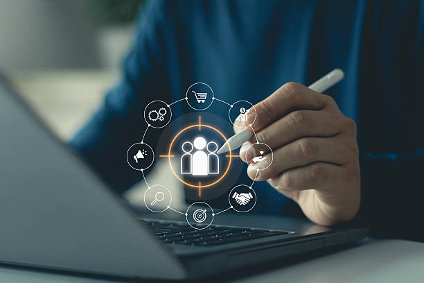 istock Target customer, customer centric strategies. Businesspeople touching on screen to target customer, buyer persona, customer behavior concept. Marketing plan and strategies. Personalization marketing. 2247694850