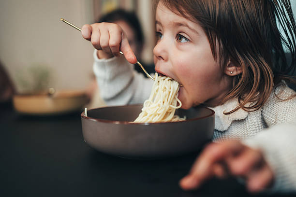 istock Messy Noodles, Happy Kids 2247699047