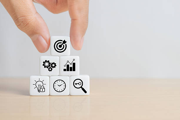istock Business success goals Concept. Hand holding target board which printing on dice for creative and set up business objective target goal concept, blocks to create ideas, set target 2247706918