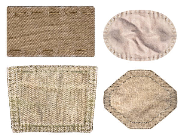 Isolated photo of various brown colored denim patches with stitch borders on white background.