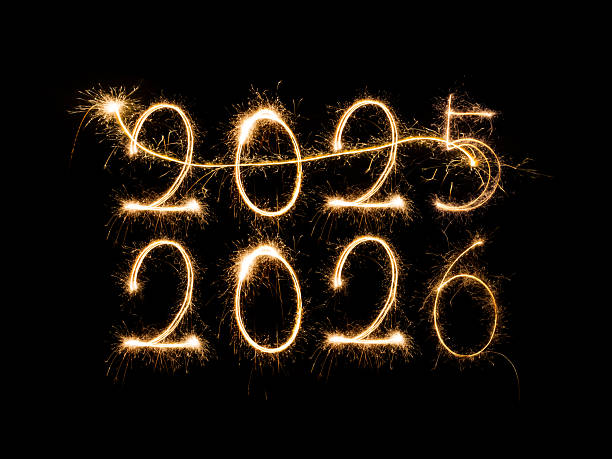 istock Burning sparkling text 2026 isolated on black background.Happy New Year 2026. 2247716339