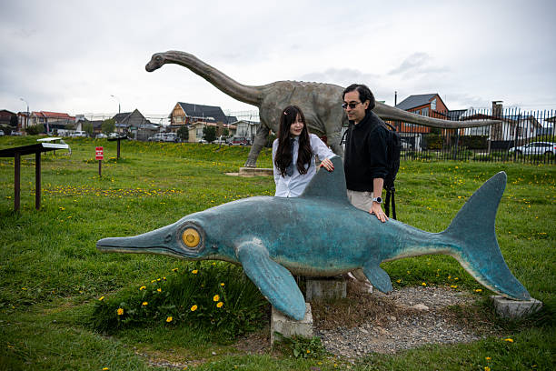 Father and Daughter Visiting Paleontology Park