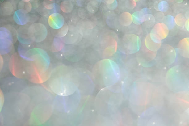 istock Shiny luxury glitter rainbow glow light flare with bokeh background 2247718476
