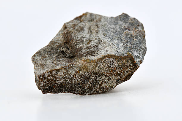 istock Rough Chromite Mineral Ore Specimen on White Background 2247728399