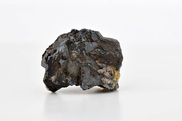 istock Rough Skarn Rock Specimen with Dark Matrix on White 2247730138