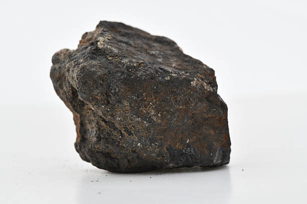 istock Rough Rhodonite Crystal in Dark Black Rock Matrix 2247730287