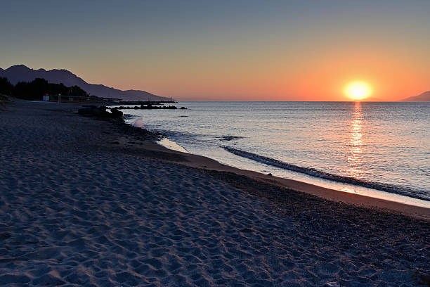 istock sun rising on the beach, Kos Greece 2247734348